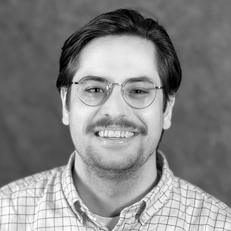 Black and white photo of Cory Landels, VIU Graphic Design Professor